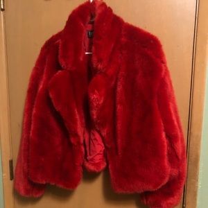 Red faux fur coat.